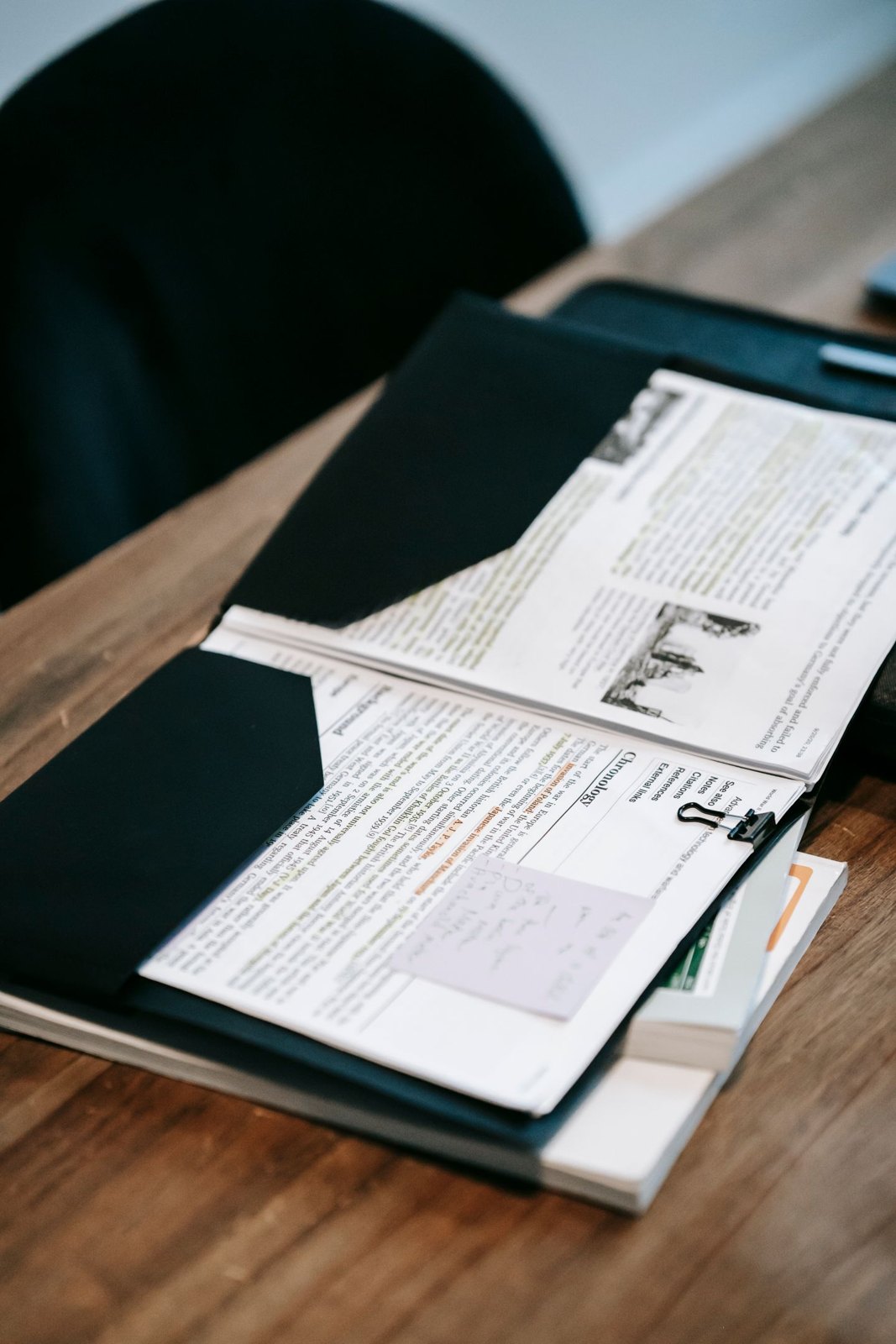 Open folder containing a printed document