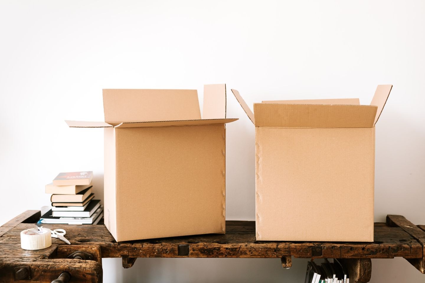 Books and stacked cardboard cartons